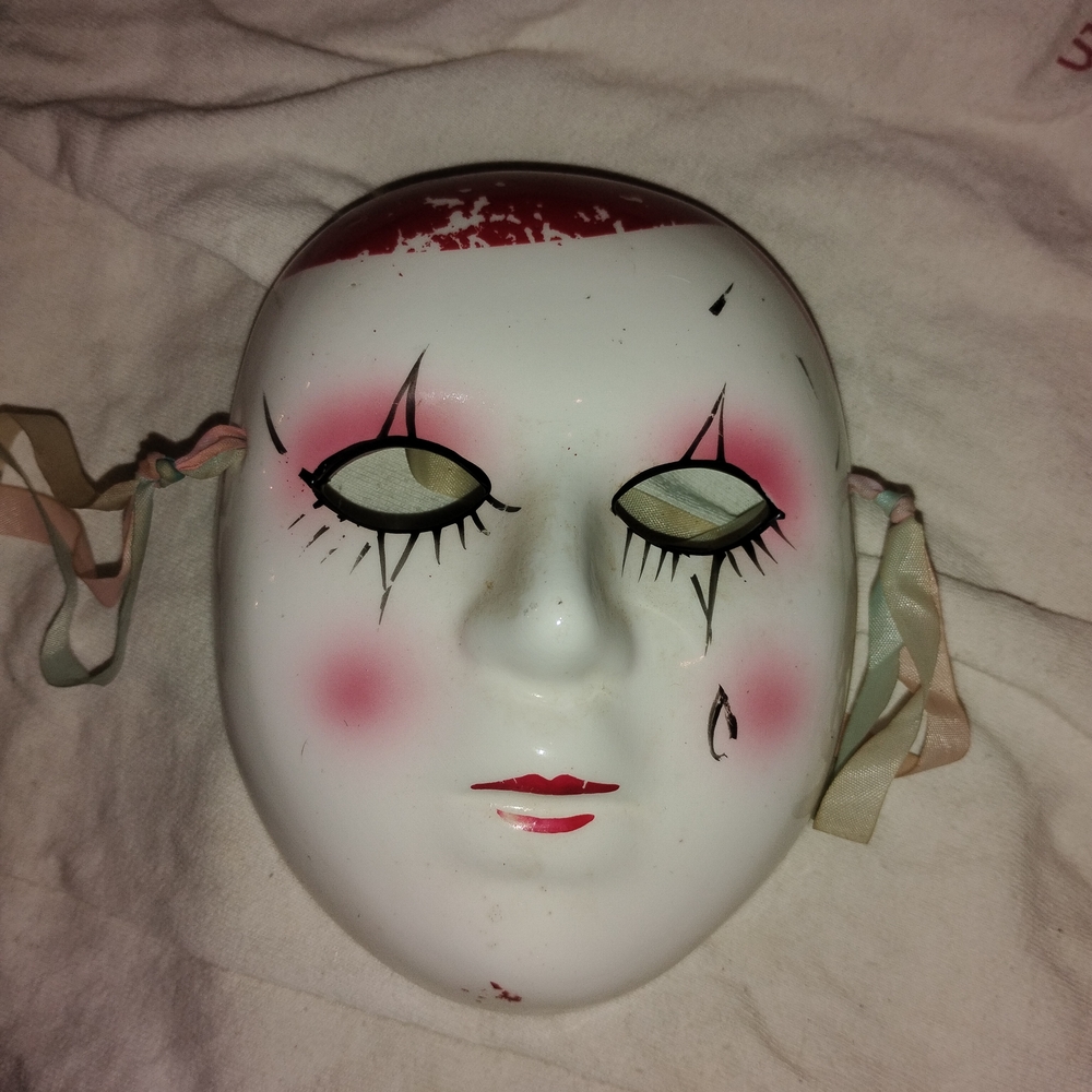 White and Pink Decorative Mask